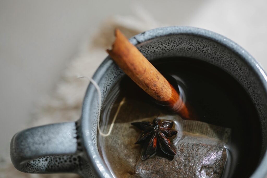 Fresh cinnamon sticks and brewed cinnamon tea, cinnamon tea